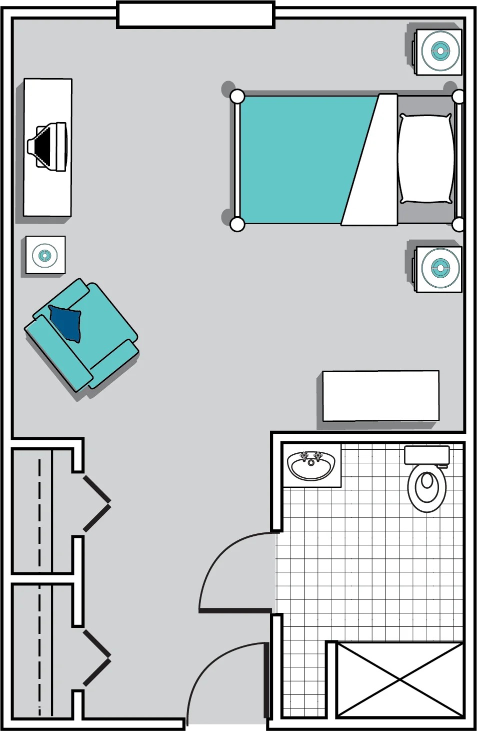 Simple room layout with bed, chair, and bathroom area.