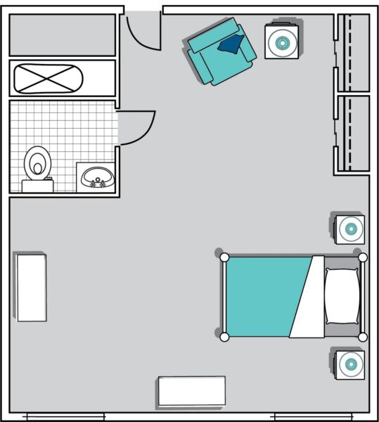 Room layout with bed, couch, bathroom, and furniture.